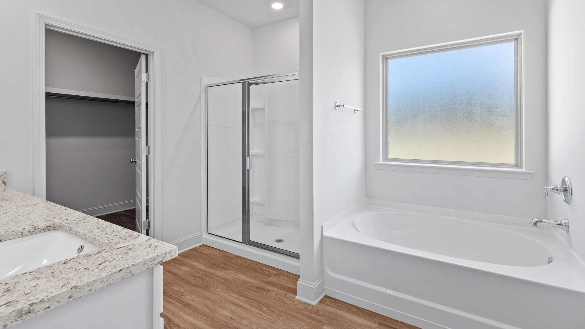 walk in shower and garden tib with frosted window