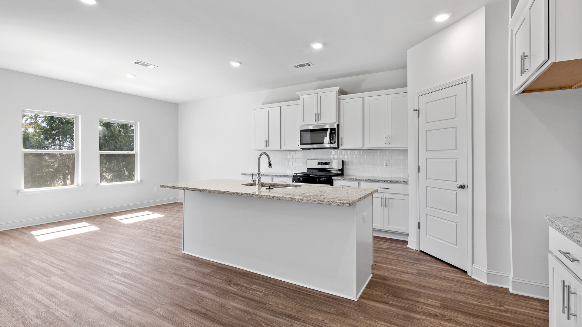 Open concept kitchen with dining area.