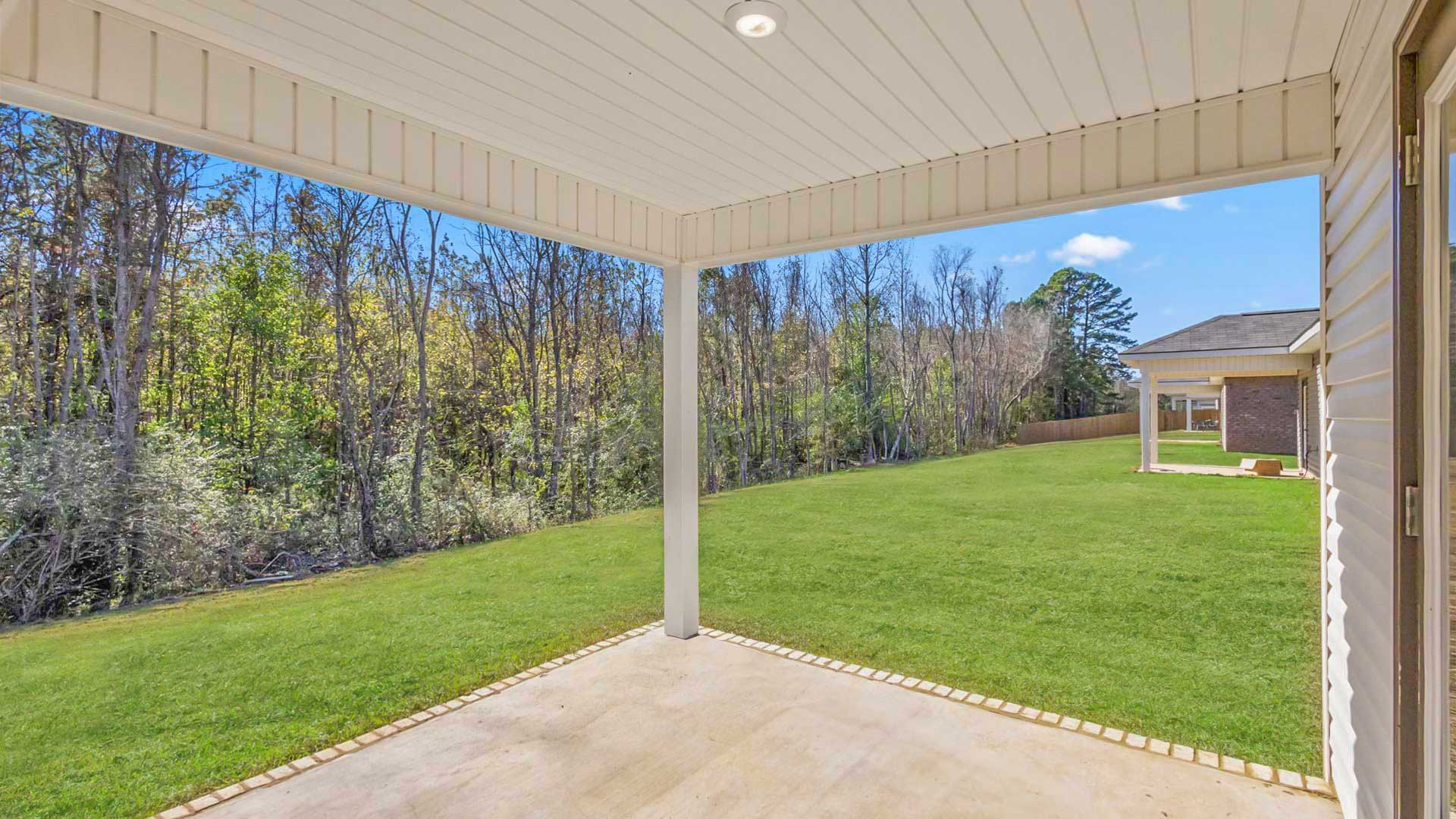 View from back patio overlooking lawn