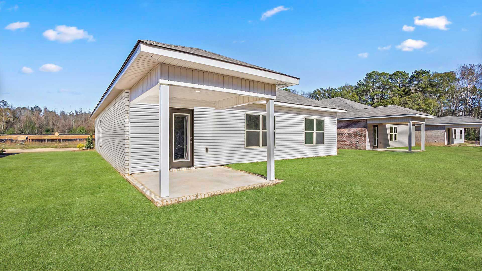 Back patio leading to greenspace