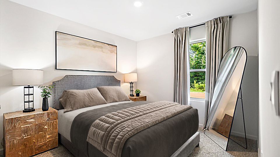 Bedroom 2 with carpeted flooring and closet