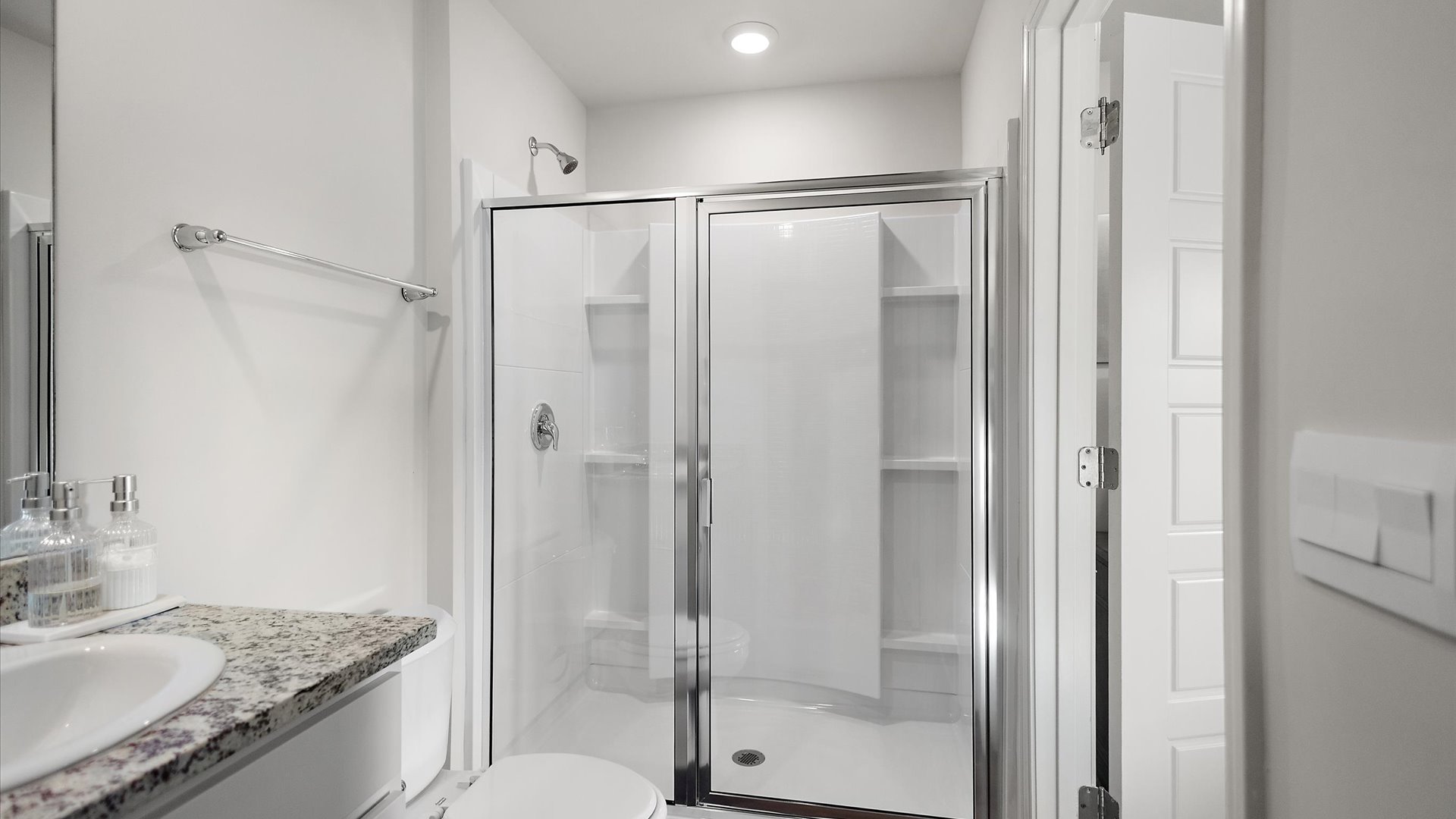 Walk in shower with built in shelving