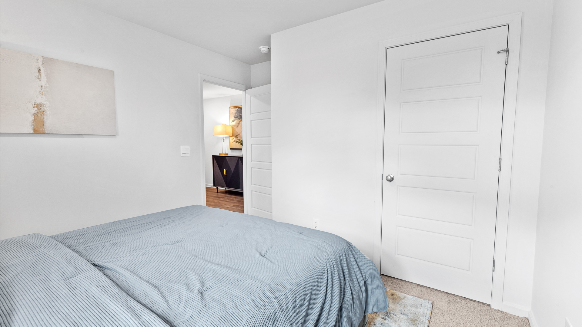 View from bedroom 3 showing the closet and the hallway.