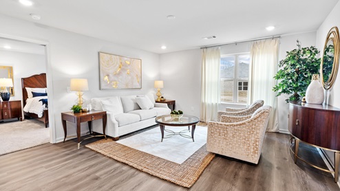 Living room with a double window.