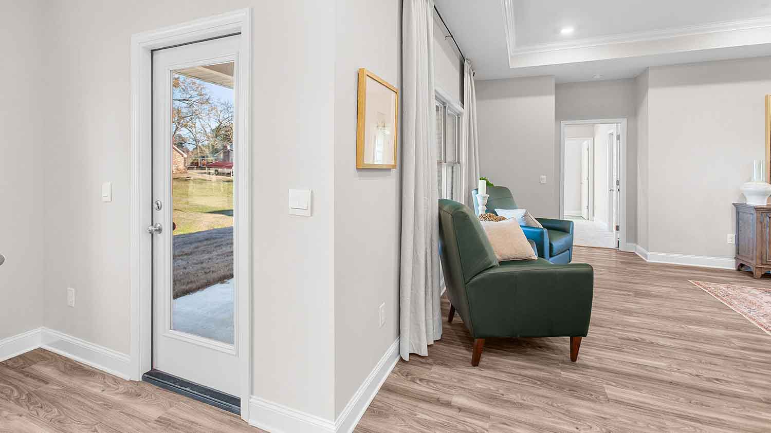 view from the dining area looking at the door that leads to the backyard
