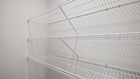 Shelving and storage in the pantry closet.