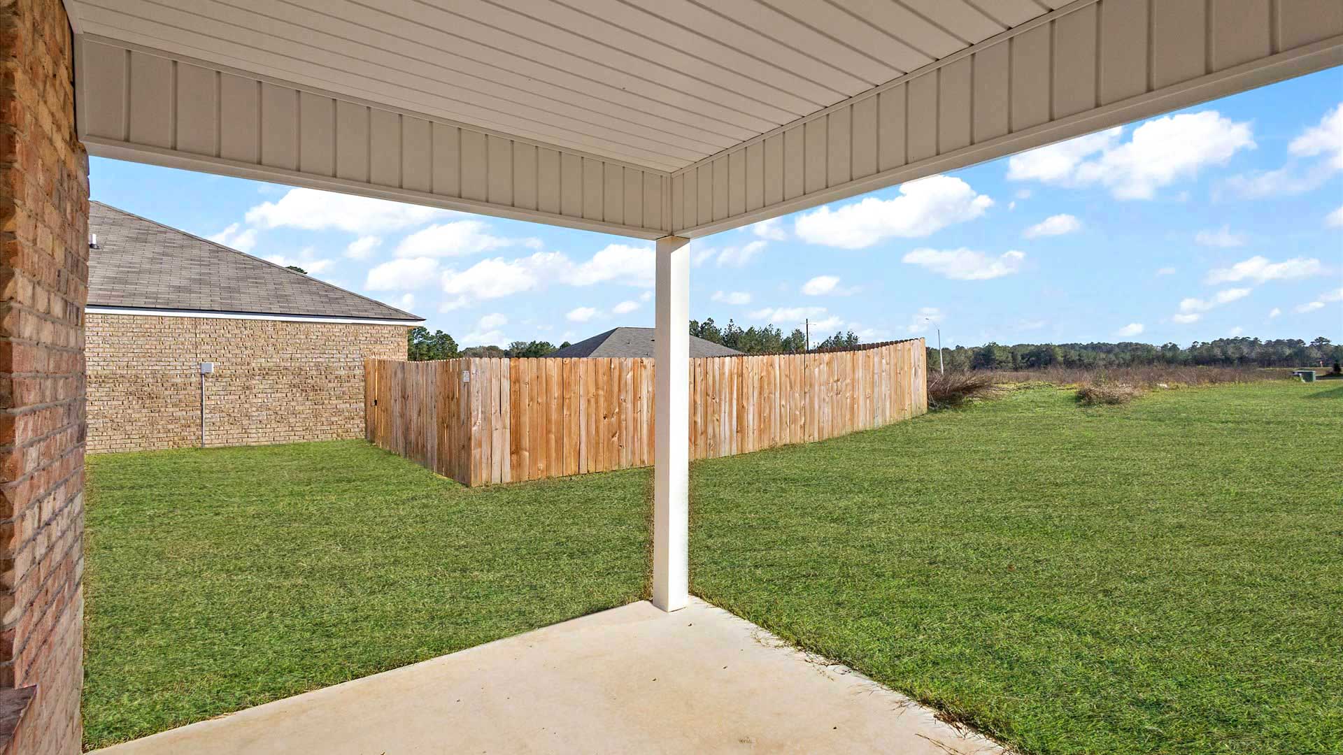 Patio overlooking backyard