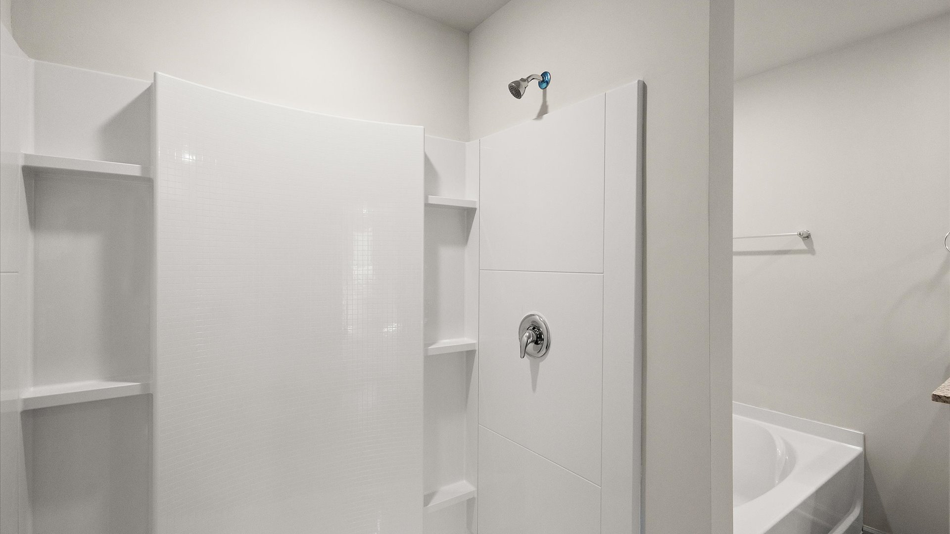 walk in shower with built in shelving