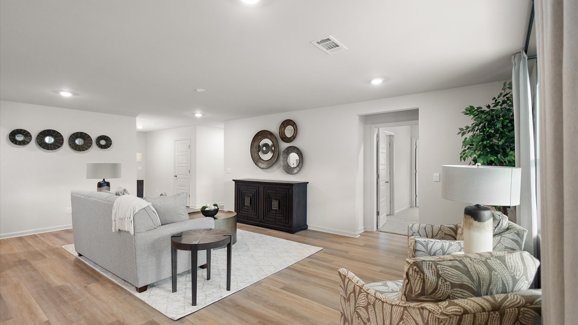 Living area with hall leading to the bedrooms.