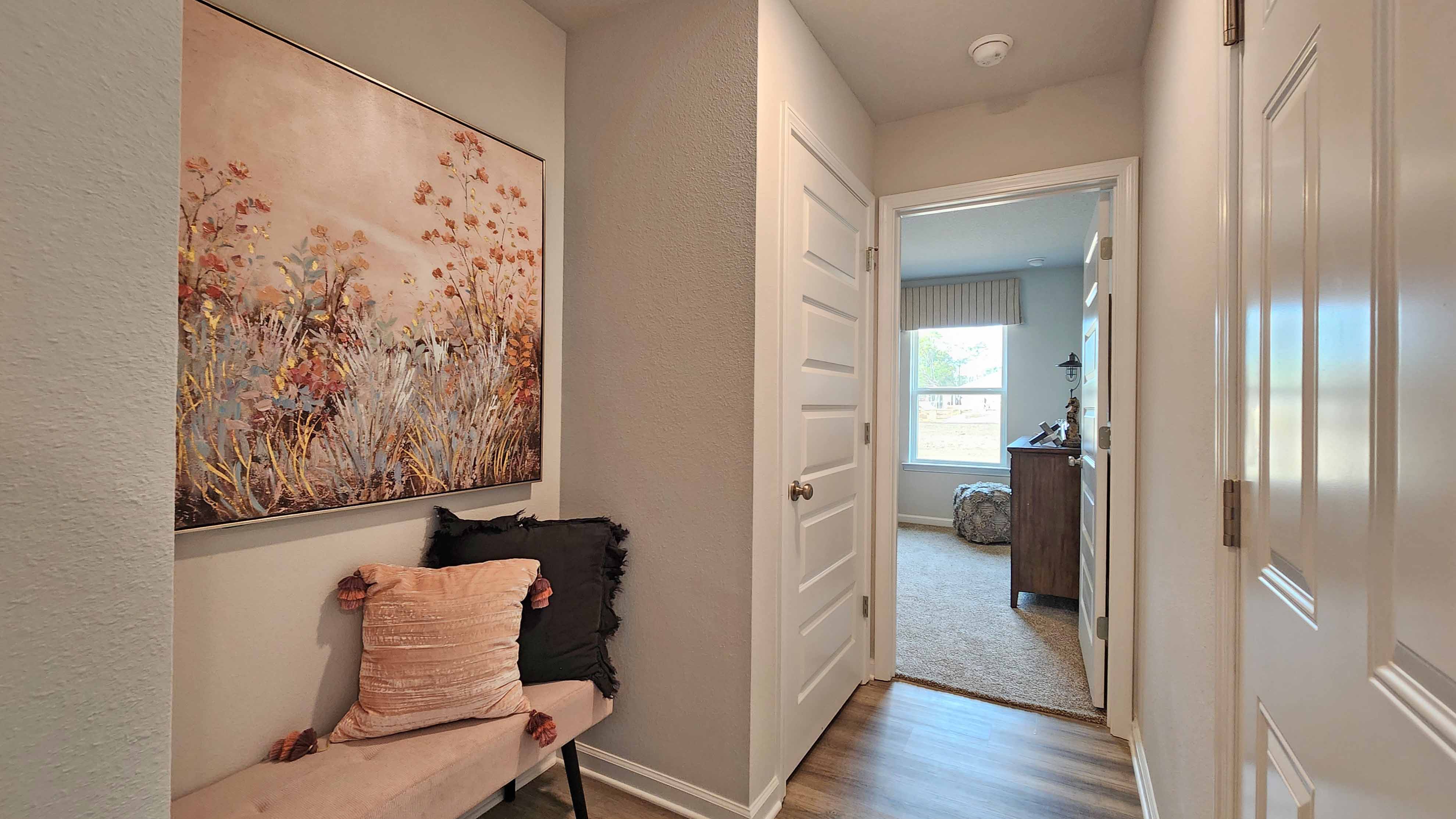 Foyer with art on the walls