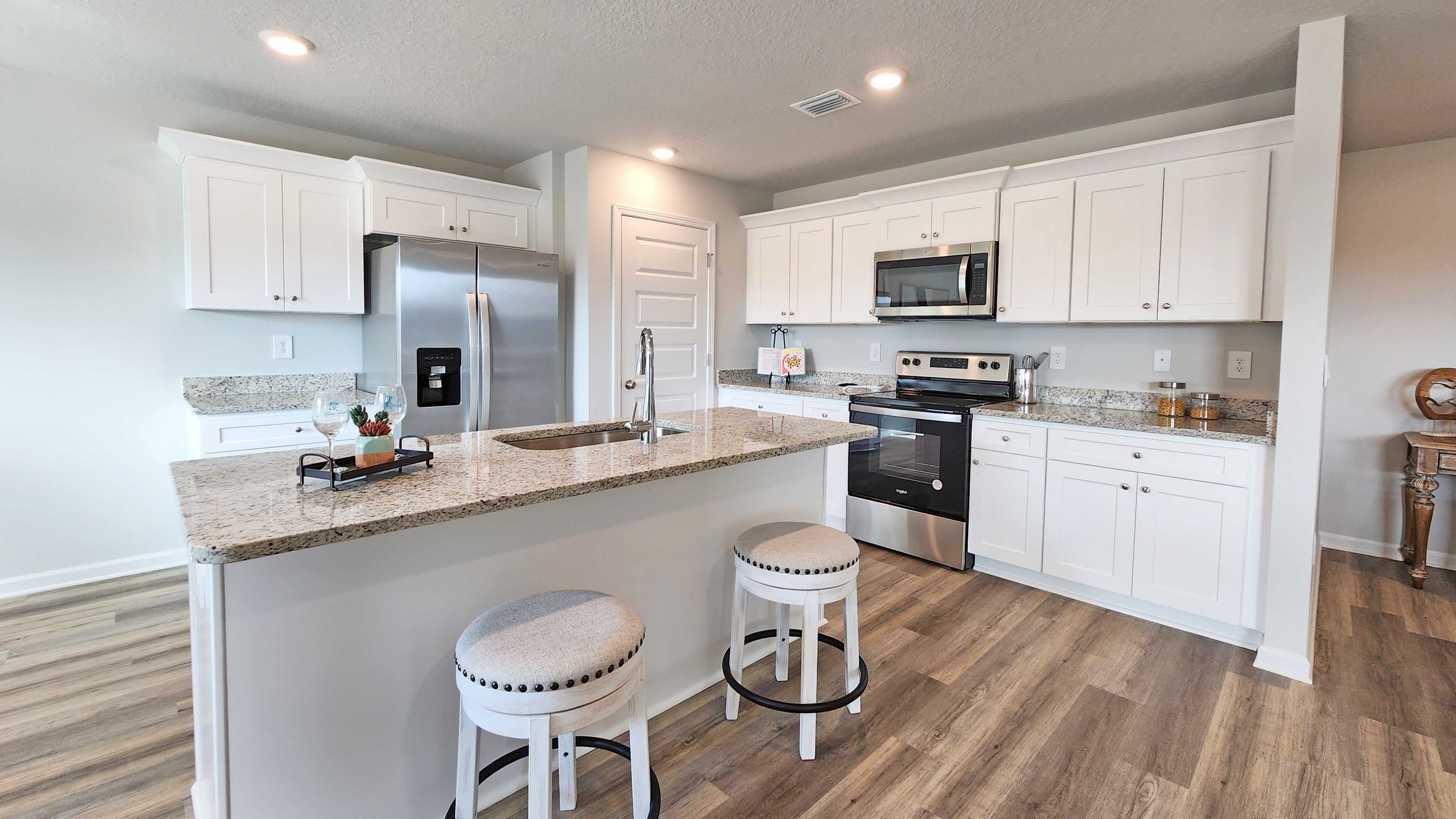 Kitchen with island and cabinets