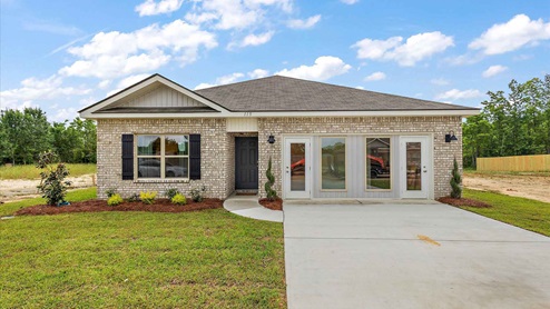 The single story aldridge has a covered entry area and driveway.