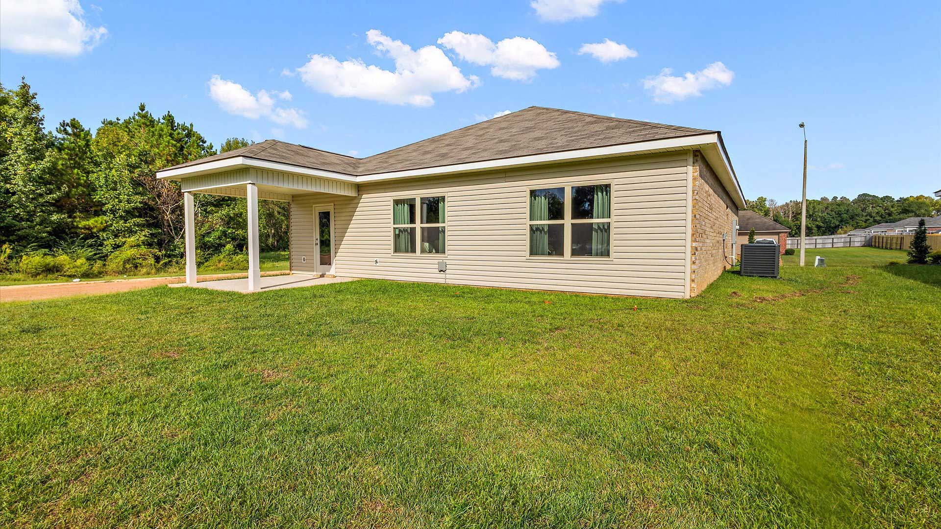 Back patio leading to greenspace