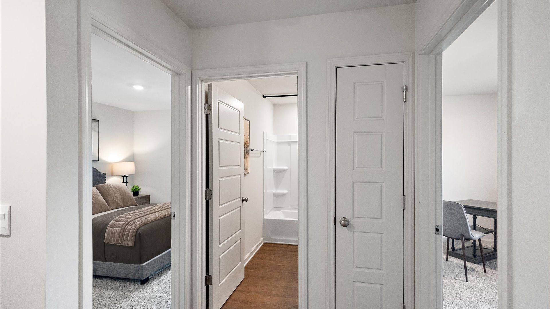 Hall bathroom with entry to bedrooms 2 and 3