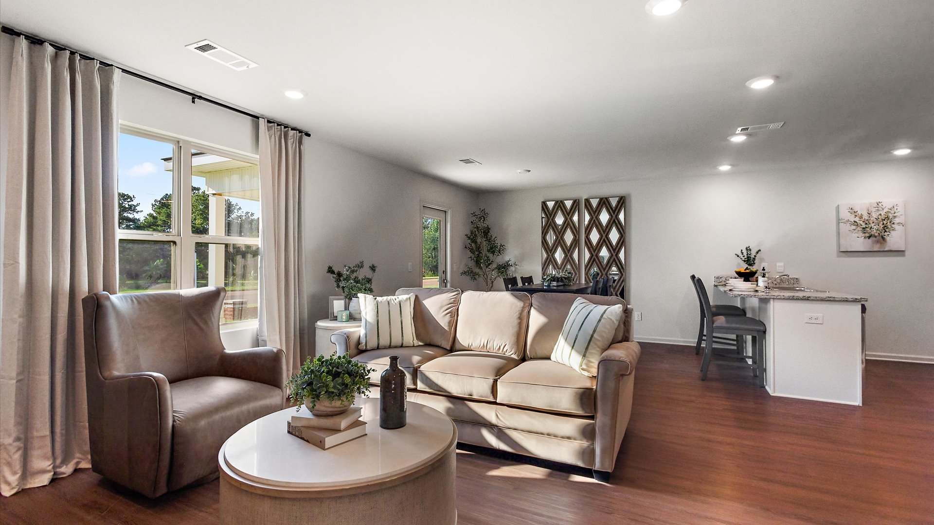 Open concept living space containing kitchen and dining