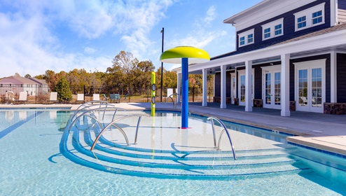 Nolen Farm community pool with water feature. New Home in Charlotte, north Carolina