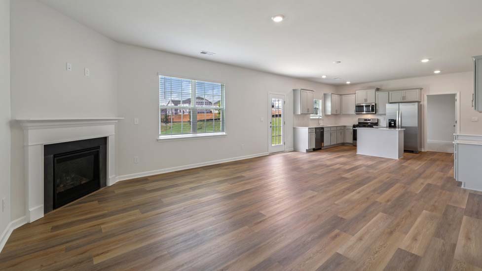 Open concept living area with large windows