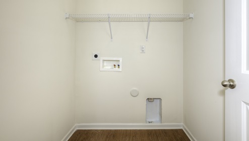 Laundry room with racks for hanging