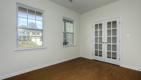 Office with french doors and two large windows