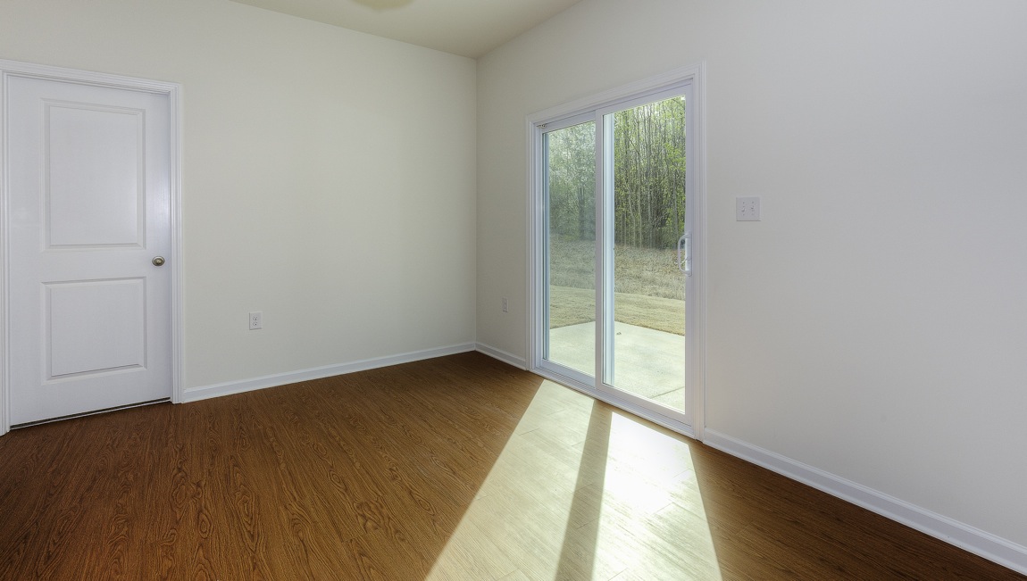 Breakfast area beside kitchen with sliding glass door