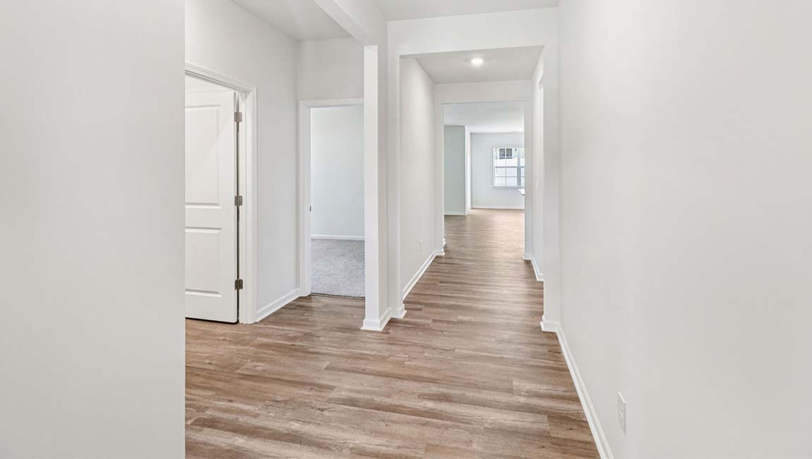 Welcoming foyer with vinyl flooring, view of interior