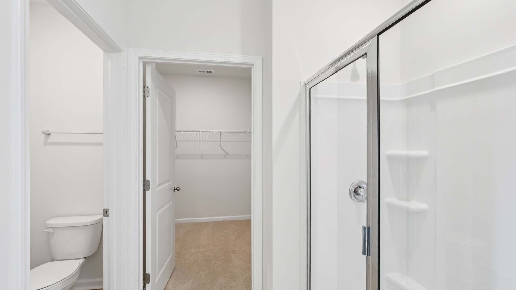 Primary bathroom with standing glass shower