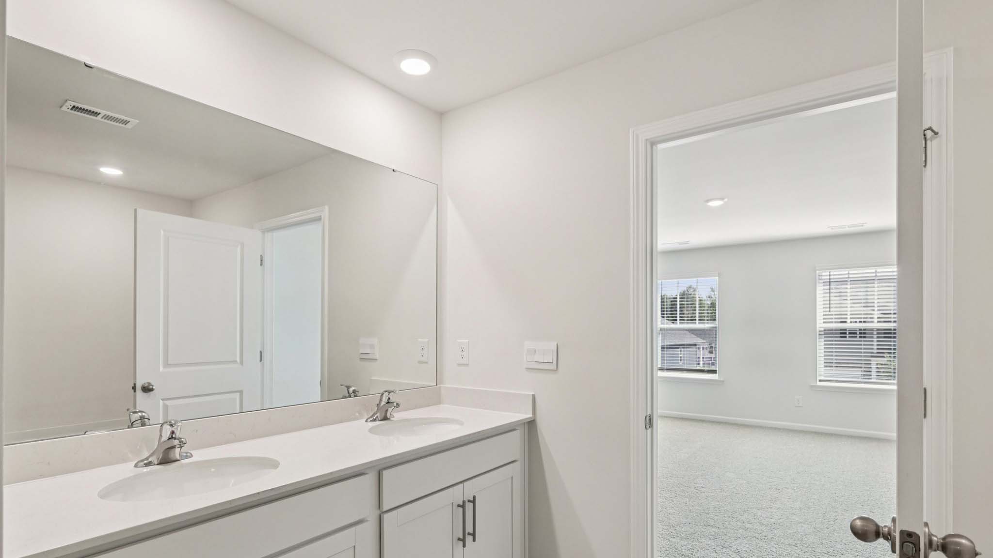 Primary bathroom with glass door shower