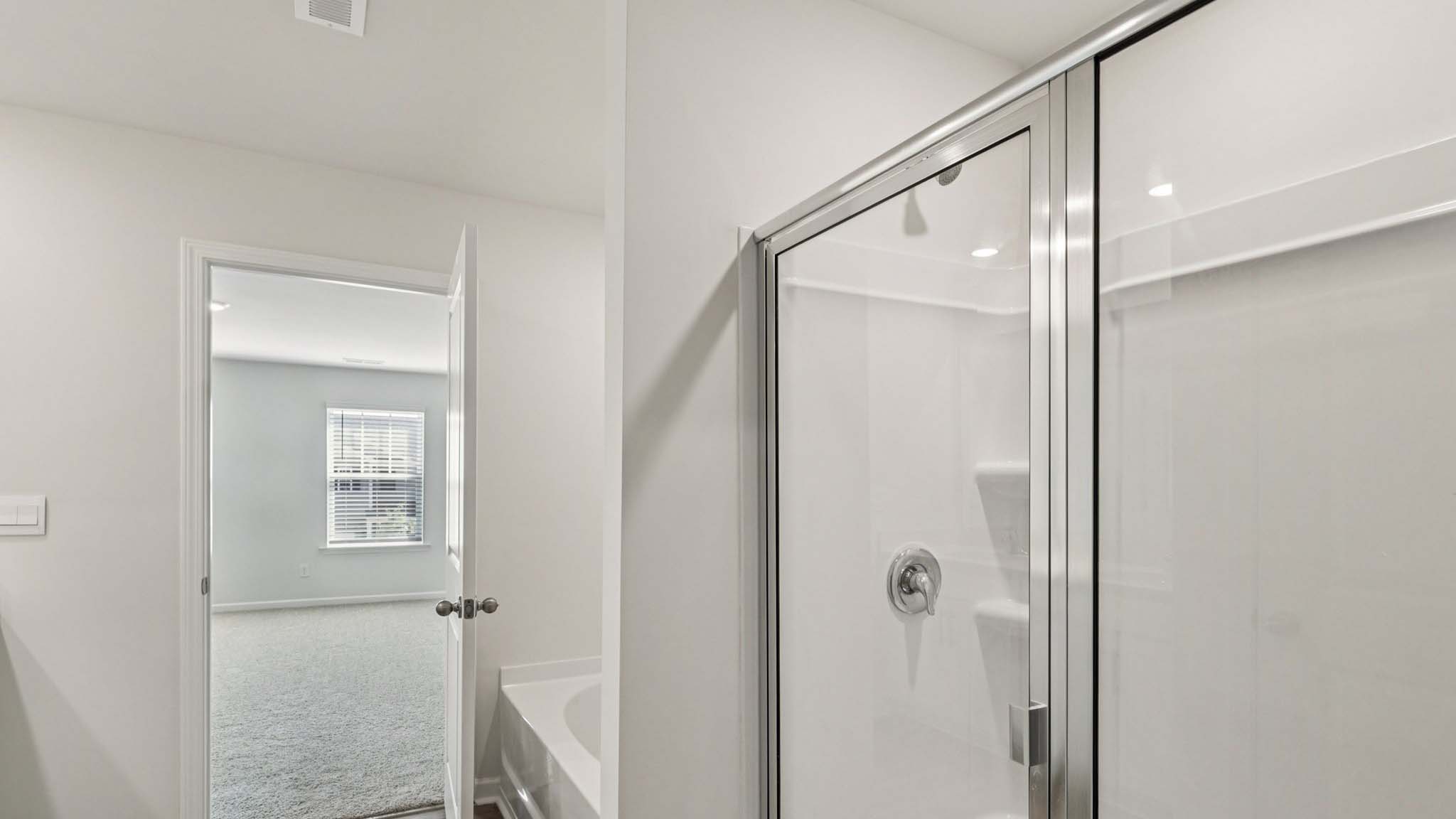 Primary bathroom with glass door shower