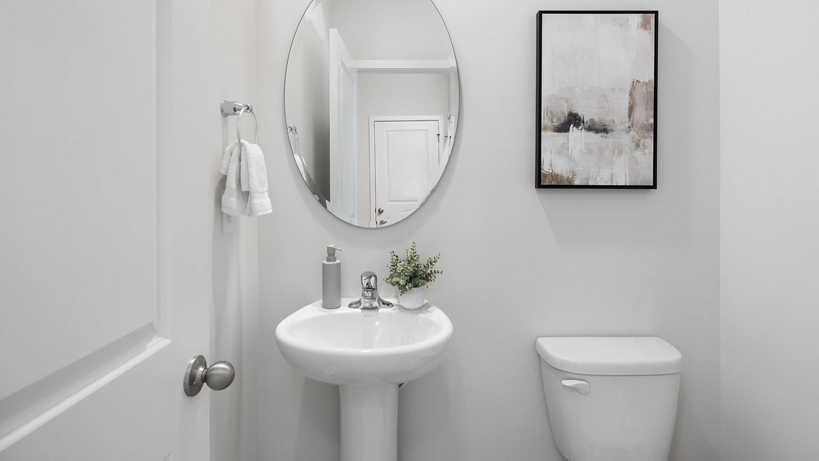 Powder bathroom with toilet and sink