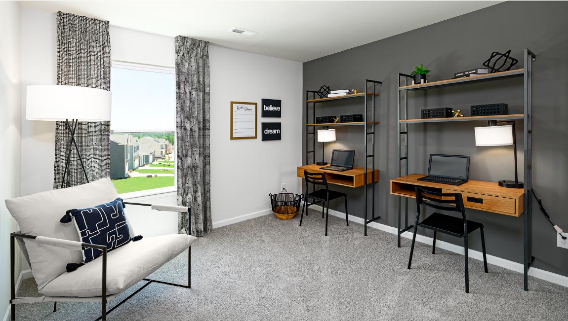 Carpeted bedroom with small window