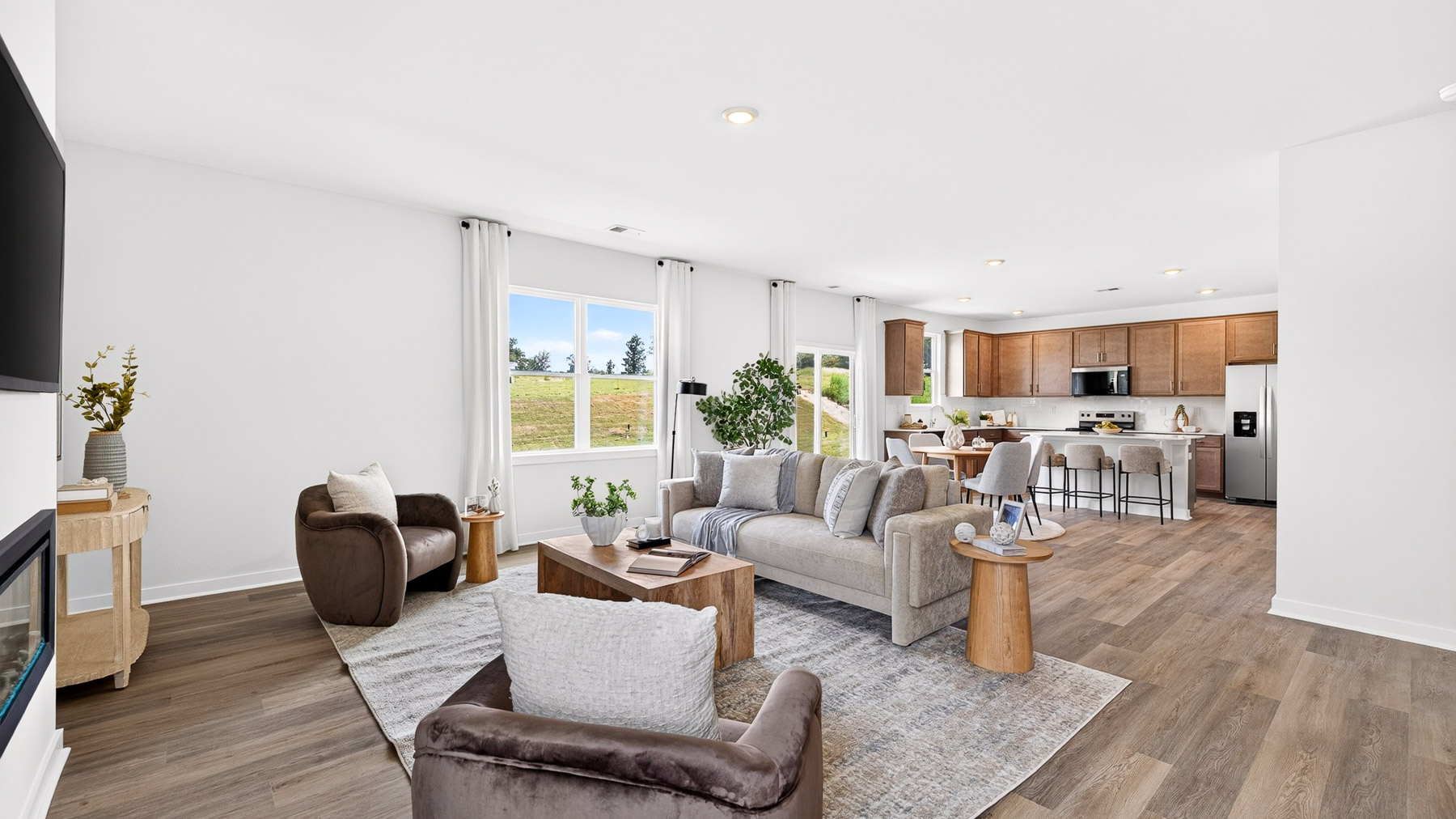 Living room area with fireplace and windows