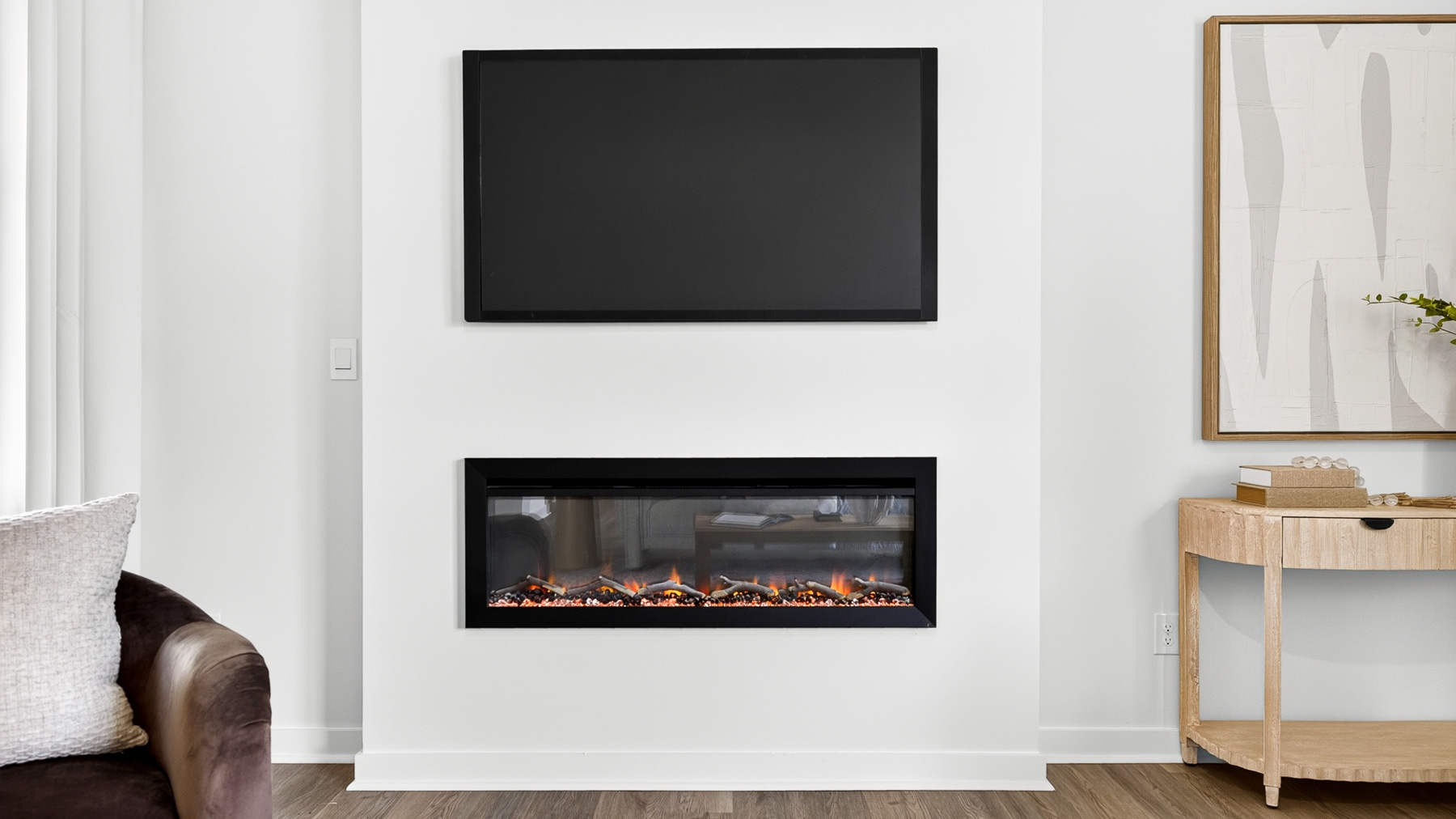 Living room area with fireplace and windows