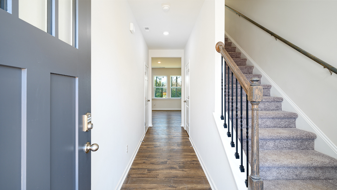 Welcoming foyer, view of staircase and home interior