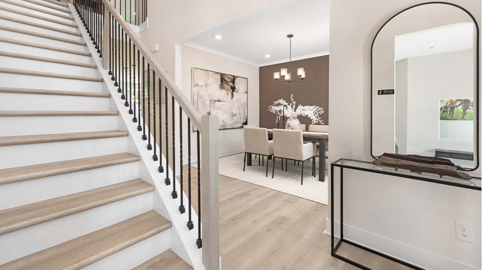 Welcoming foyer, view of stairs and front door