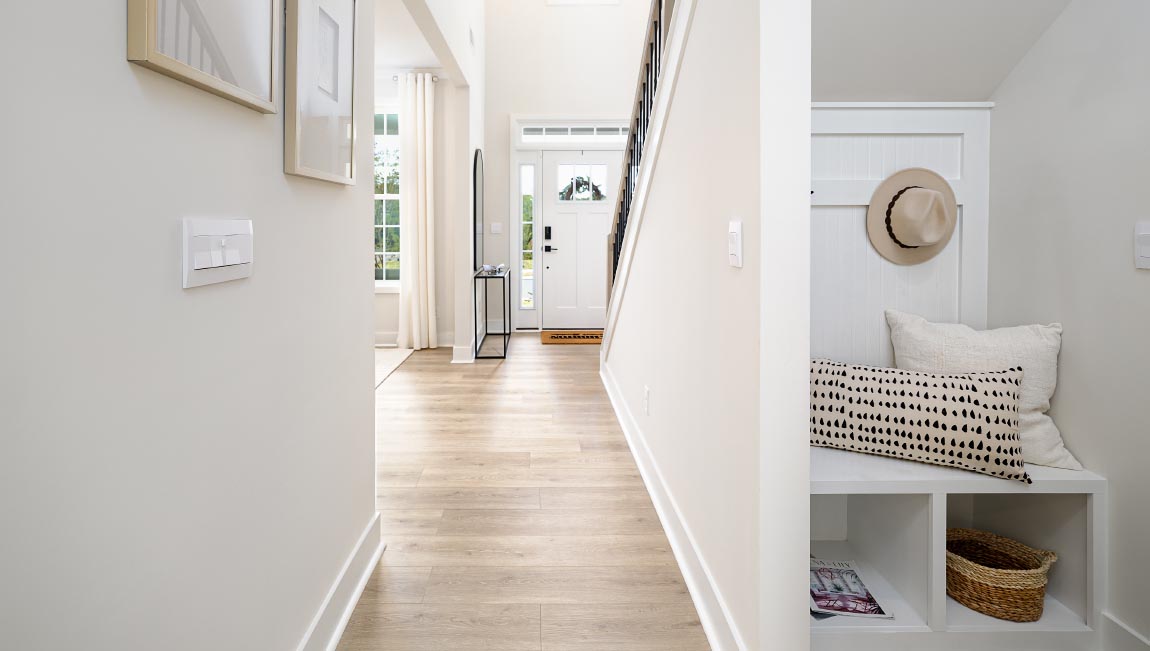 Welcoming foyer, view of stairs and front door