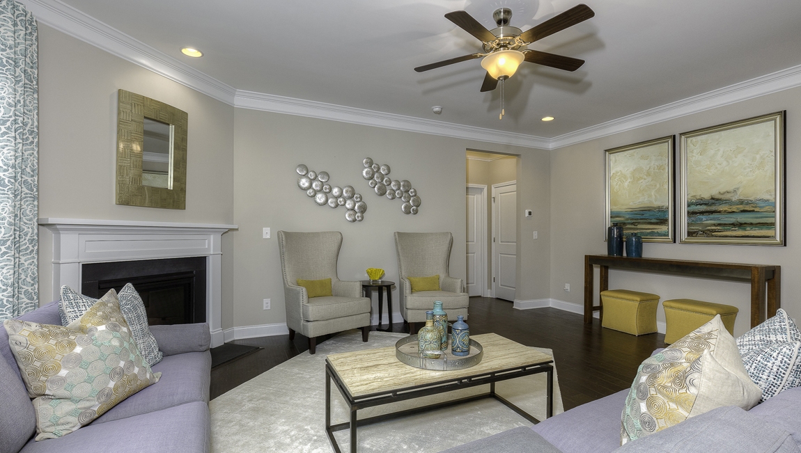 Family room with wood floors and fireplace