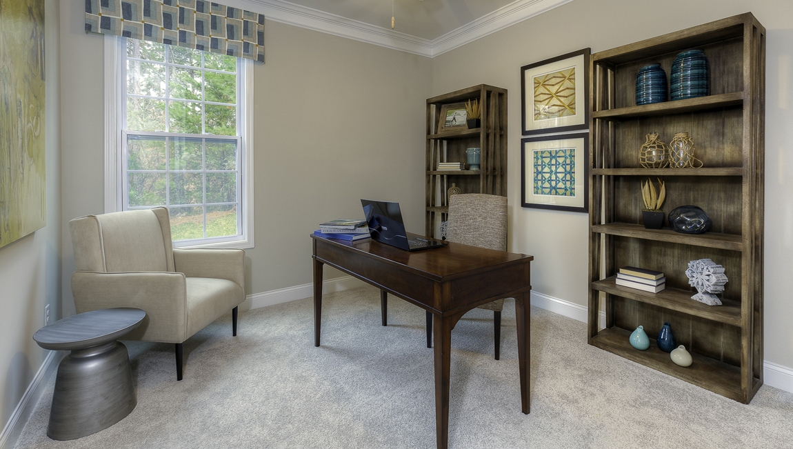 Carpeted bedroom with medium window