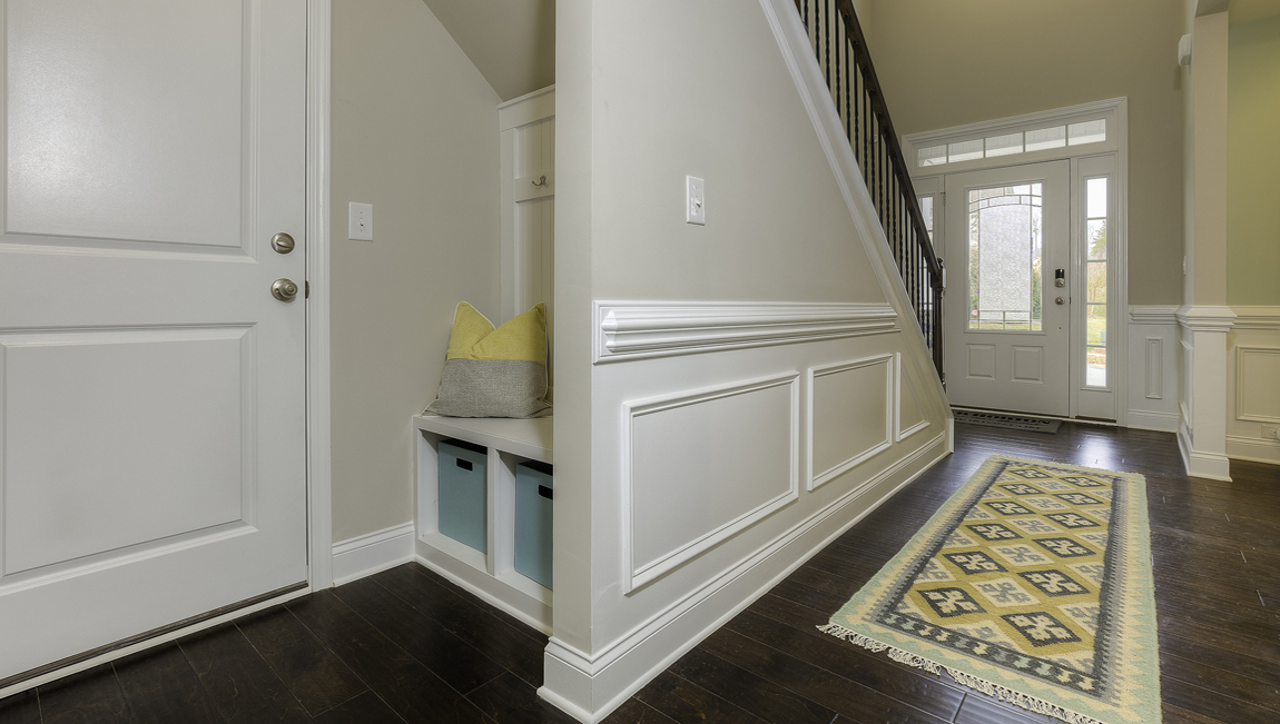 Welcoming foyer, view of drop zone and front door