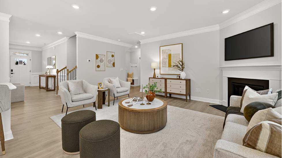 Family room with large window and fireplace