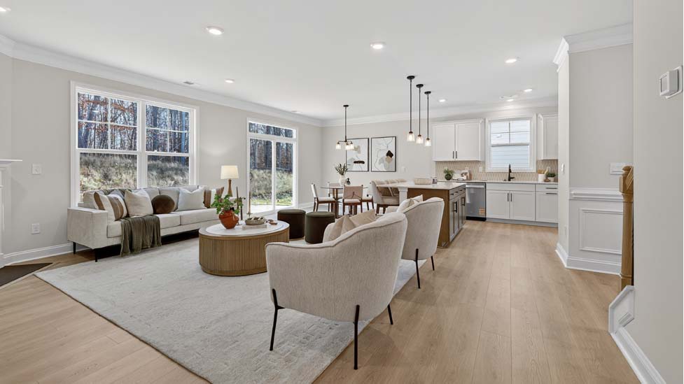 Family room with large window and fireplace