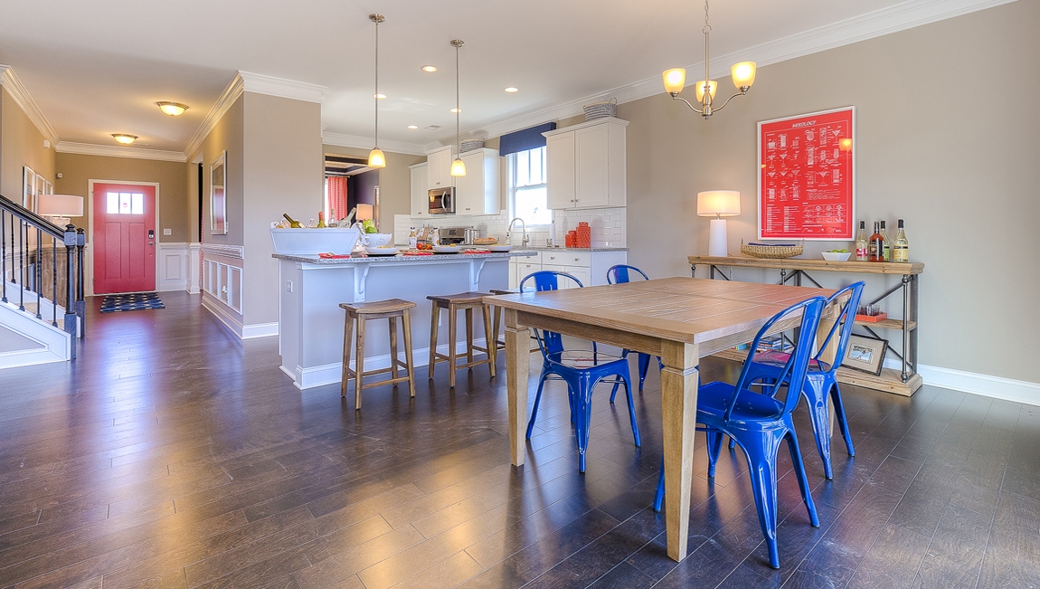 Casual dining area beside kitchen and sliding glass back door