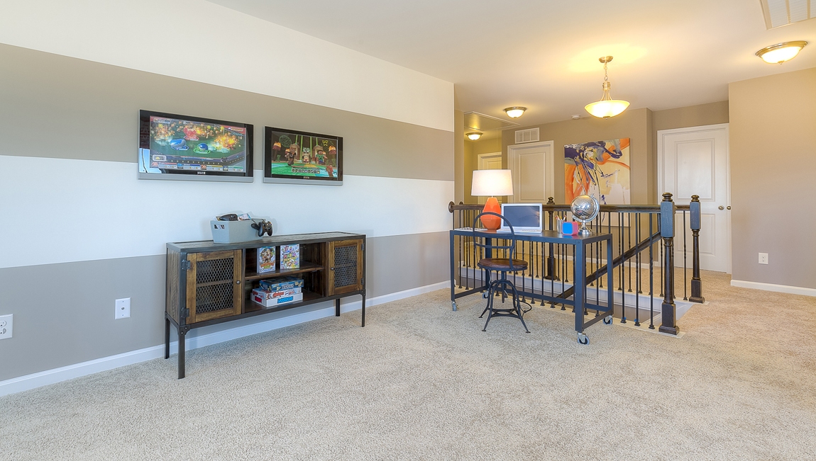 Upstairs Recreational room with carpet and two small windows