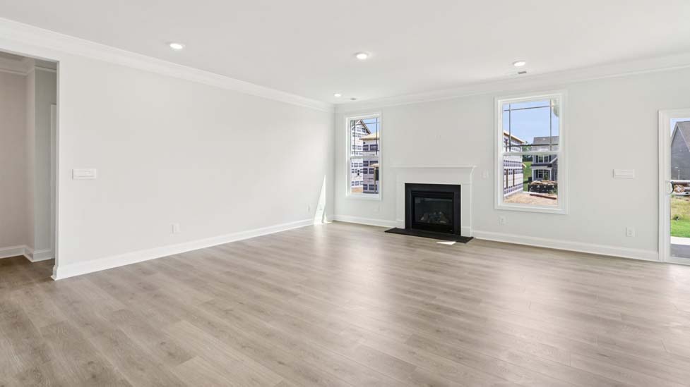 Open family room with large windows