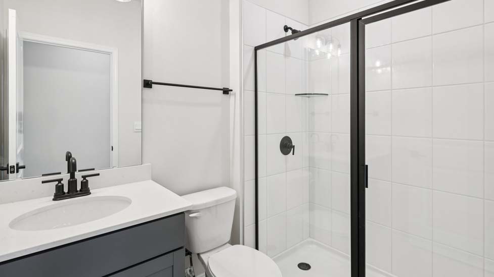 Bathroom with standing glass shower