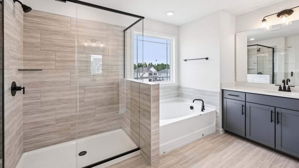 Primary bathroom with standing glass shower
