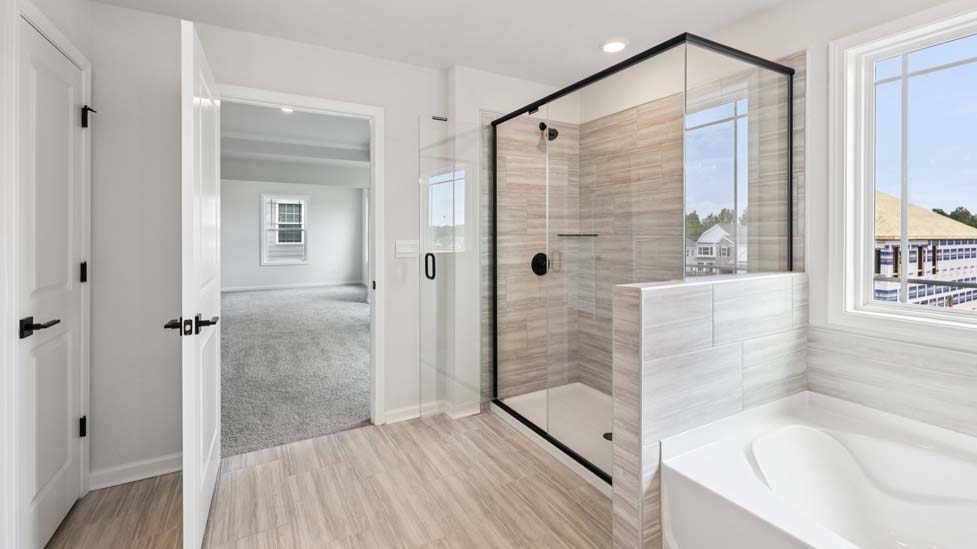 Primary bathroom with standing glass shower