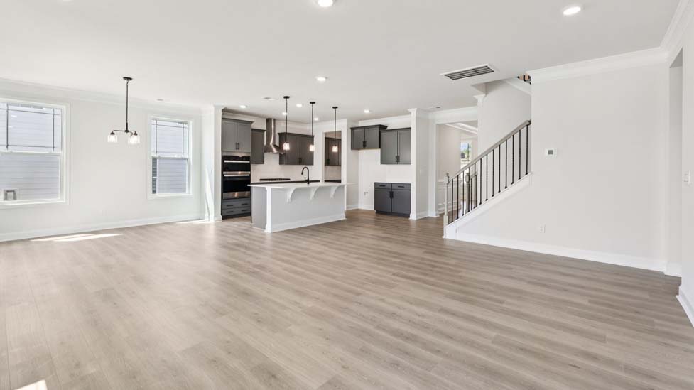 Open family room with large windows