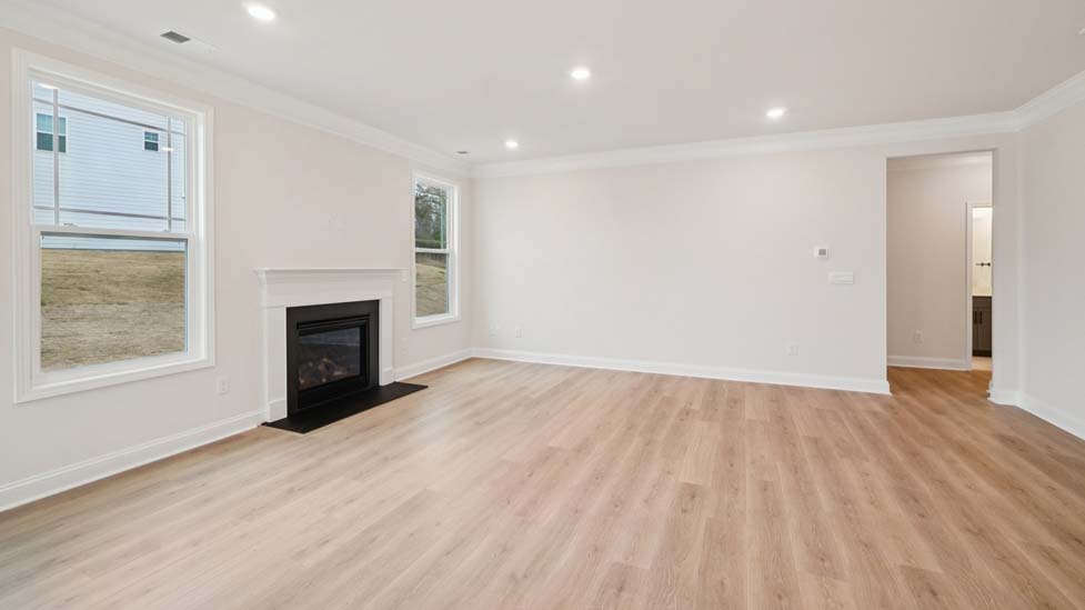 Open family room with large windows