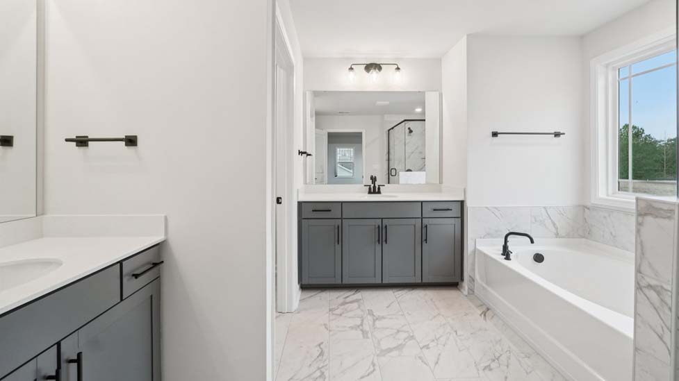 Primary bathroom with standing glass shower