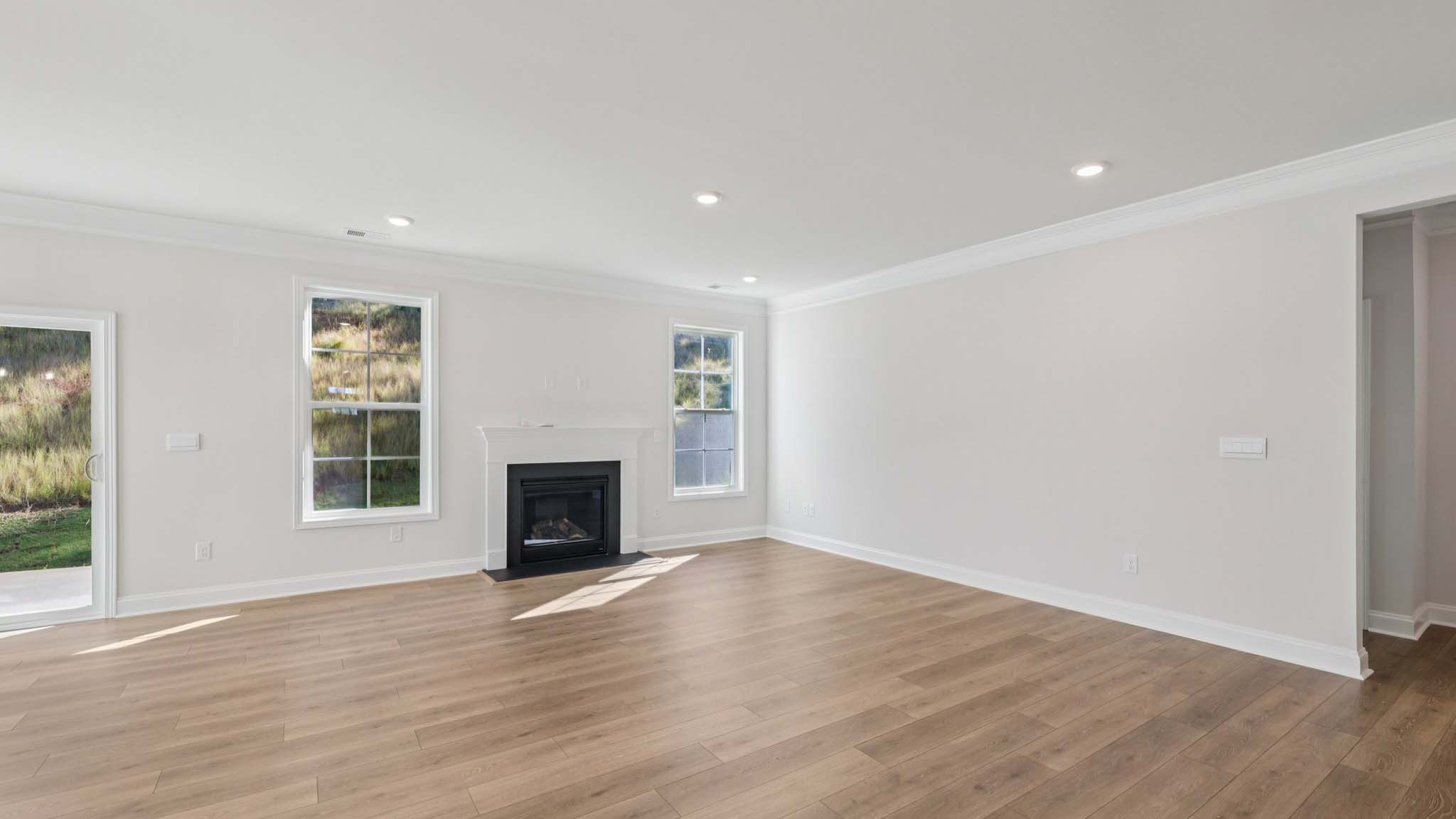 Open family room with large windows
